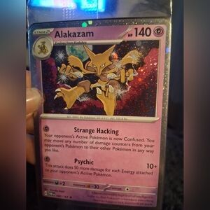 Pokemon Alakazam Trading Card - Pink and Gold